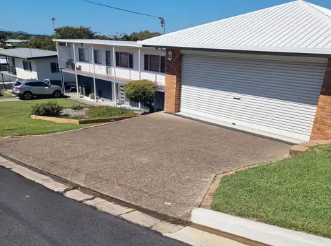 A worn driveway before resealing